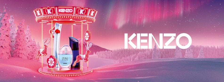 Kenzo-Parfümflakons stehen auf einem pink beleuchteten Karussell vor winterlicher Schneelandschaft mit Polarlichtern am Himmel. Rechts ist das Kenzo-Logo groß eingeblendet.