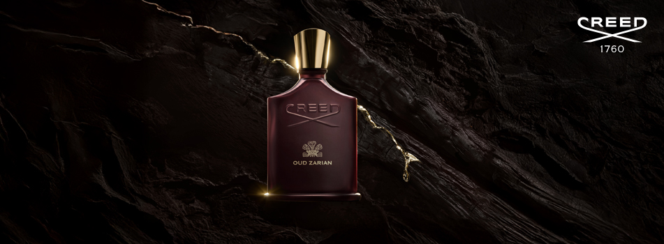 Dunkel inszeniertes Werbebild des Parfums Creed Oud Zarian. Die bordeauxrote Flasche mit goldenem Verschluss steht vor schwarzem, steinartigem Hintergrund. Oben rechts ist das Creed-Logo mit Jahreszahl 1760 zu sehen.