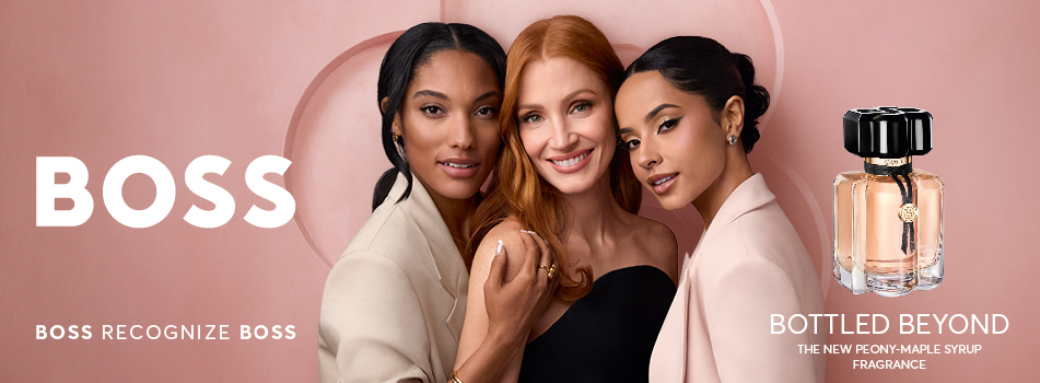 BOSS Bottled Beyond for Her Parfum – Werbemotiv mit drei Frauen und Flakon vor rosafarbenem Hintergrund